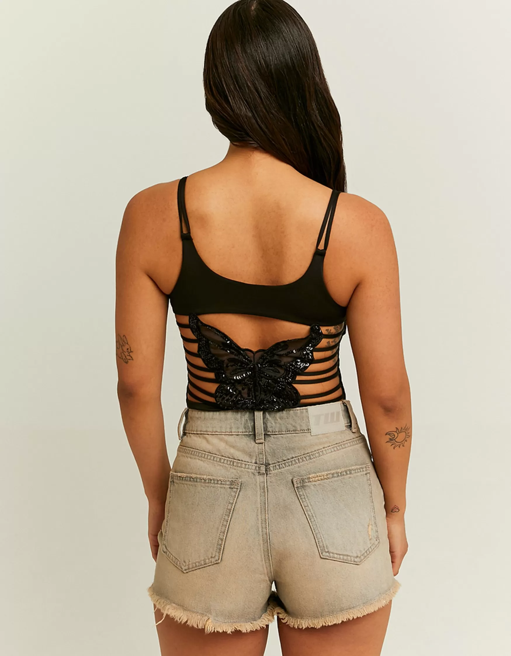 Store Body avec Découpes et Papillons Body